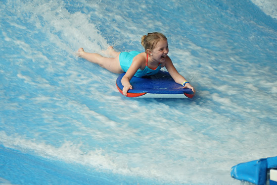 uploads/Things To Do/Gallery/flowrider/Girl-Blue-Swimsuit.jpg